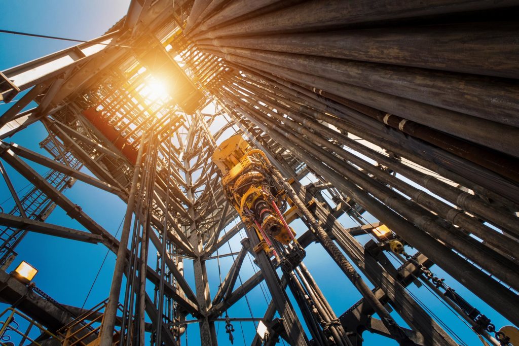 oil and rig platform in sunset